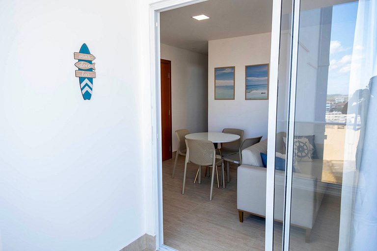 2Q Novo na Praia da Areia Preta | Ar + Garagem